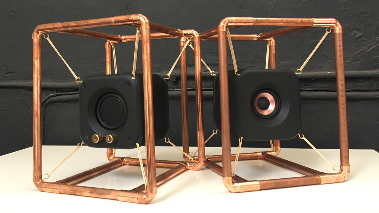 Stereo Speakers Suspended in Copper Pipe Frame